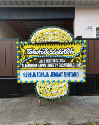 Papan Bunga Duka di Laksana
